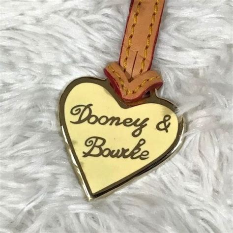 fake dooney and bourke heart charm